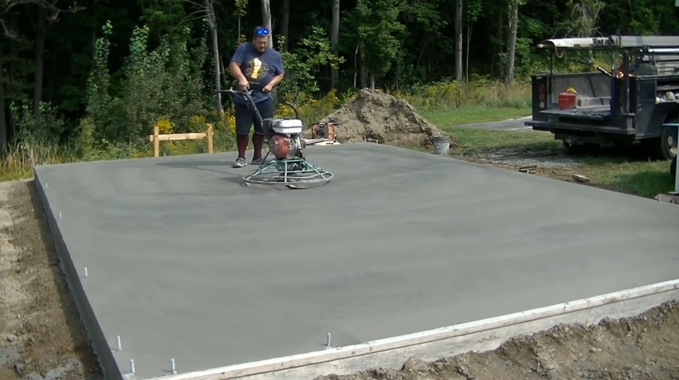 Concrete slab and foundation work with power trowel finishing